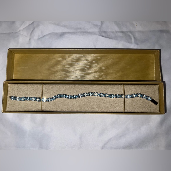 JTV 19.40 CTW Oval Blue Topaz Rhodium Over Sterling Silver Tennis Bracelet - Picture 1 of 5